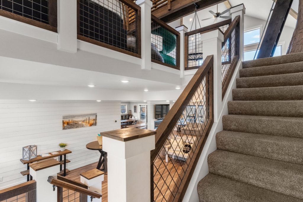Game room with indoor kids slide and treehouse