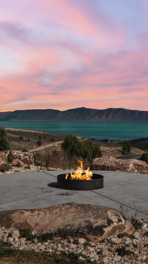 Fire pit at twilight overlooking Bear Lake